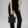 Paloma Mini – Tasche mit Henkel – genarbtes Kalbsleder und Spikes „Loubinthesky“ – Schwarz Paloma Mini – Tasche mit Henkel – genarbtes Kalbsleder und Spikes „Loubinthesky“ – Schwarz